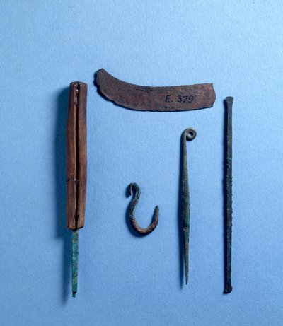 Chisel, awl, knife and fish hook by Egyptian